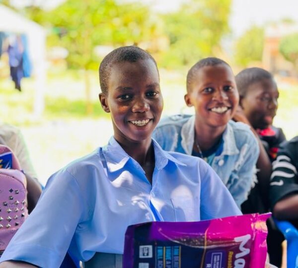 grateful faces after receiving pack of reusable sanitary pads
